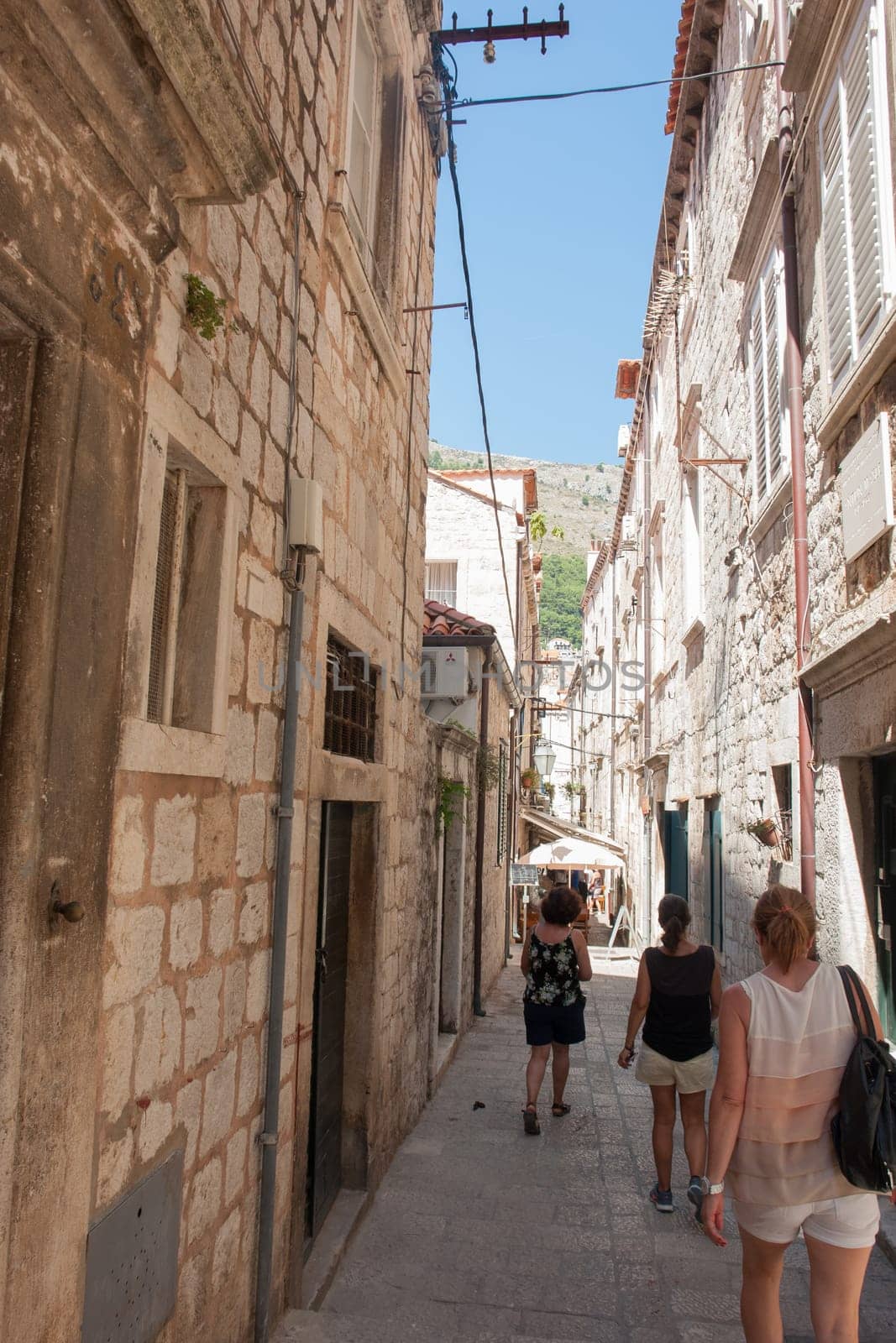 DUBROVNIK, CROATIA - AUG 3, 2016: Unidentified tourists in the Old town of Dubrovnik, Croatia. Dubrovnik is a UNESCO World Heritage site