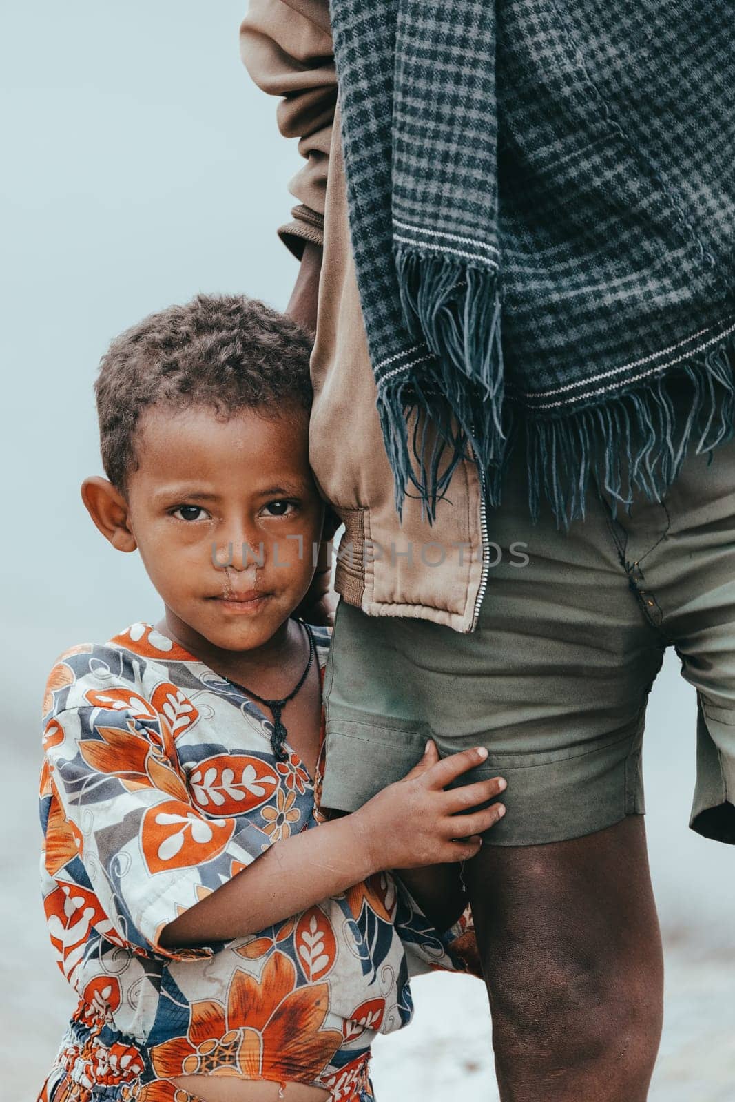 AMHARA REGION, ETHIOPIA, APRIL 22.2019, Ethiopian girl with father herdsman near Gondar city. Amhara region, Ethiopia, April 22. 2019