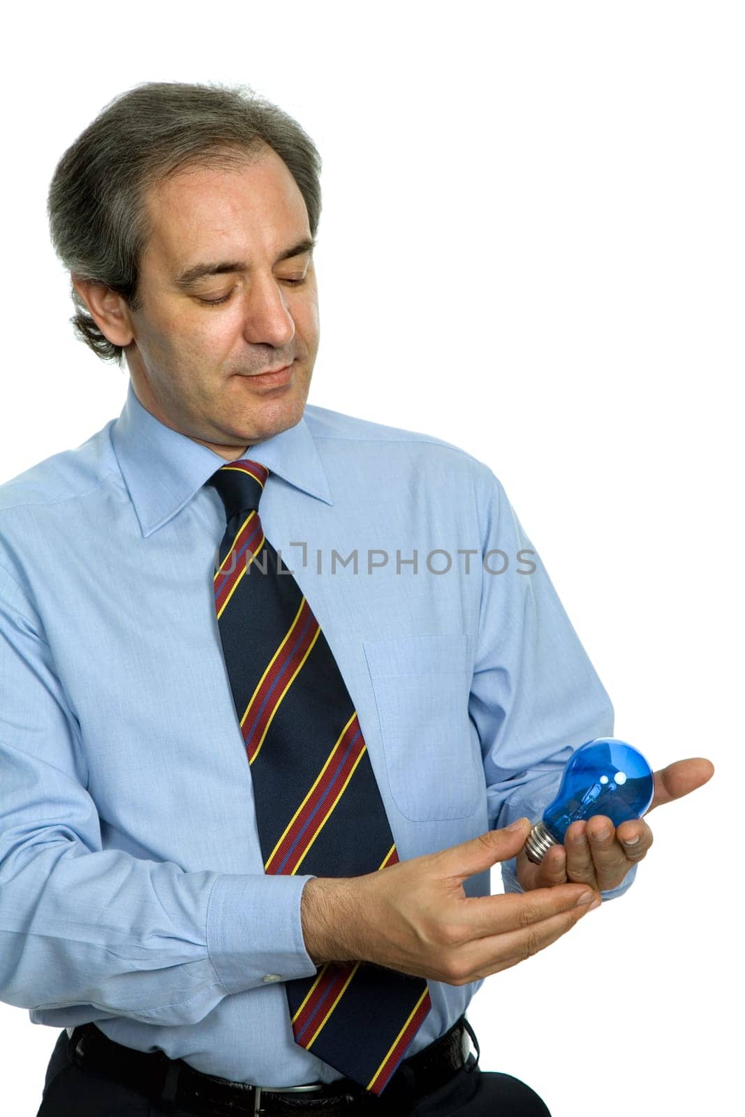 mature business man with a lamp isolated on white