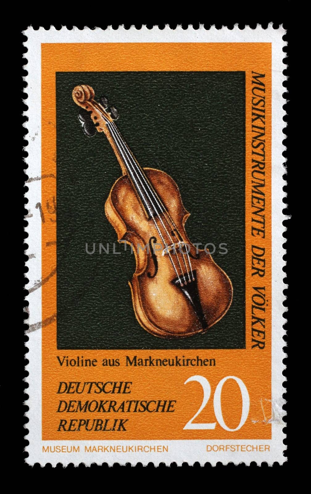 Stamp issued in Germany - Democratic Republic (DDR) shows Violin, Musical Instruments from the Music Museum in Markneukirchen, circa 1971.