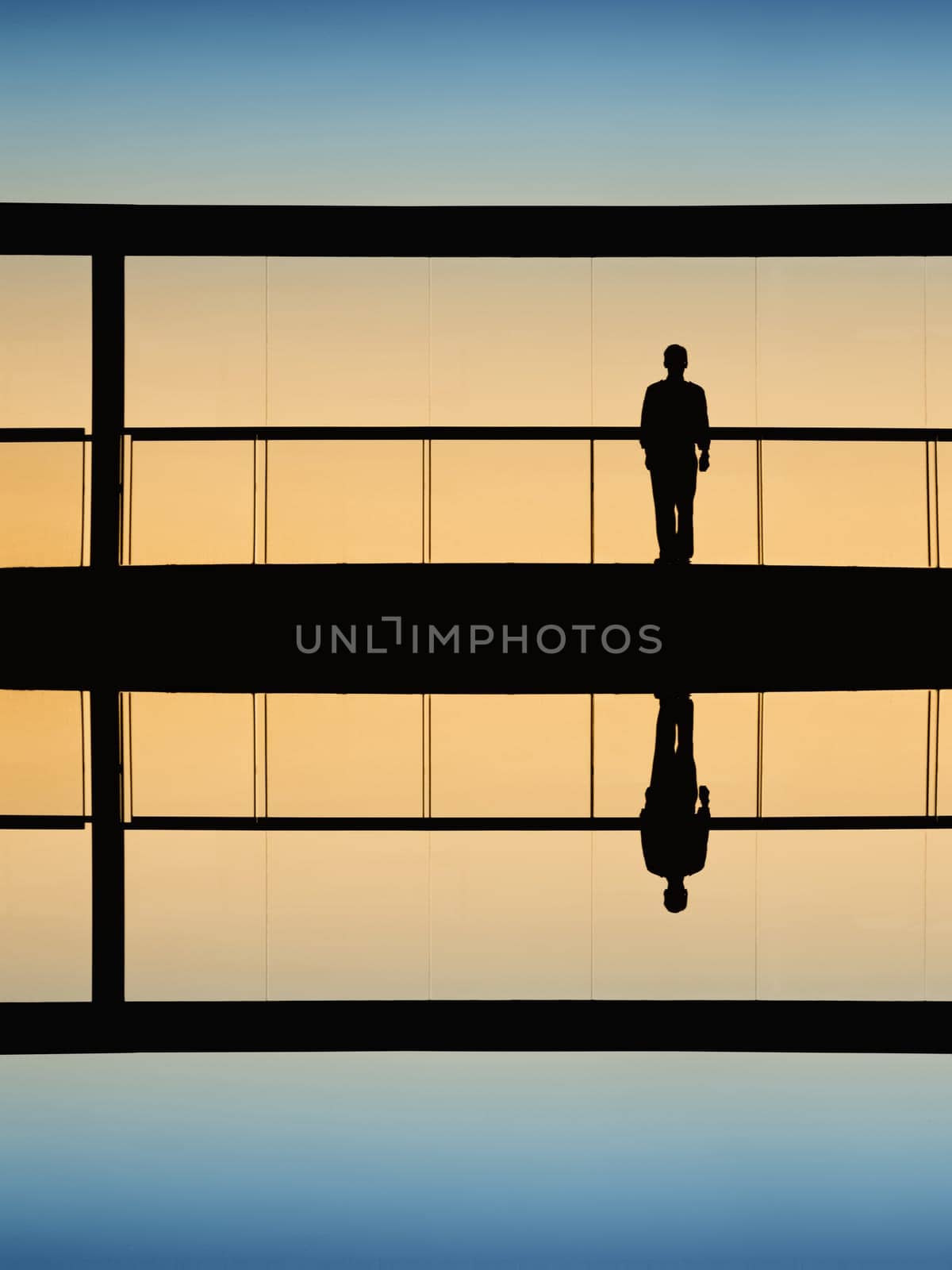 worker inside the modern building in silhouette