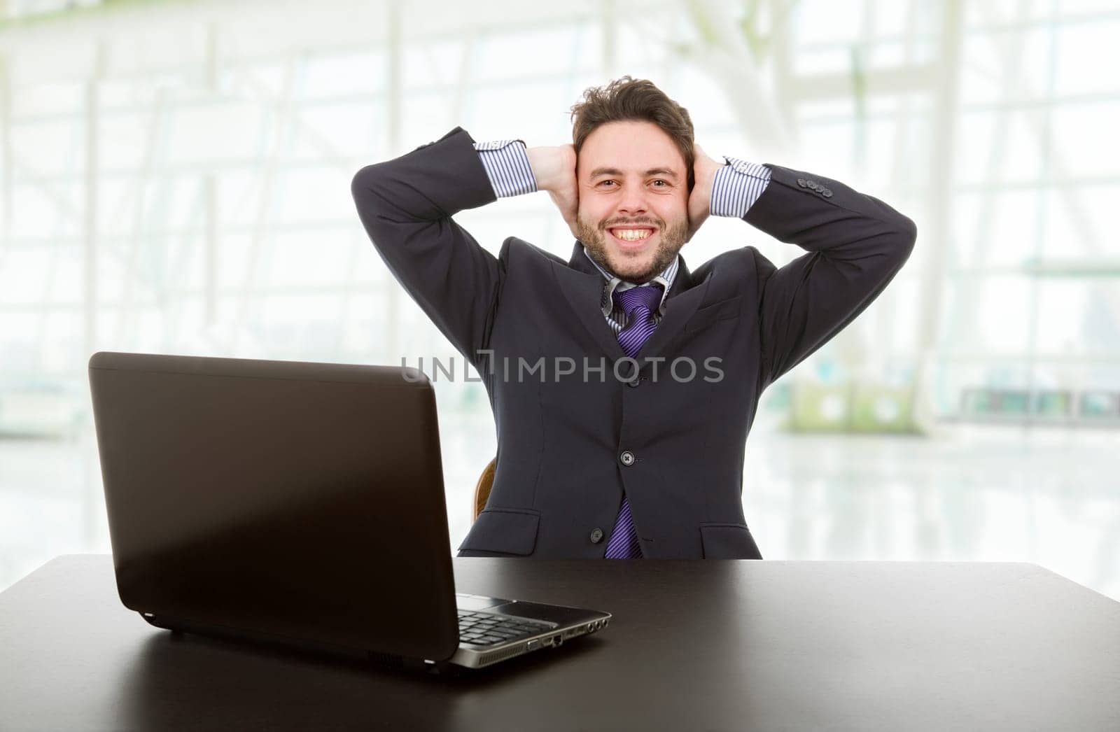 business man working with is laptop at the office