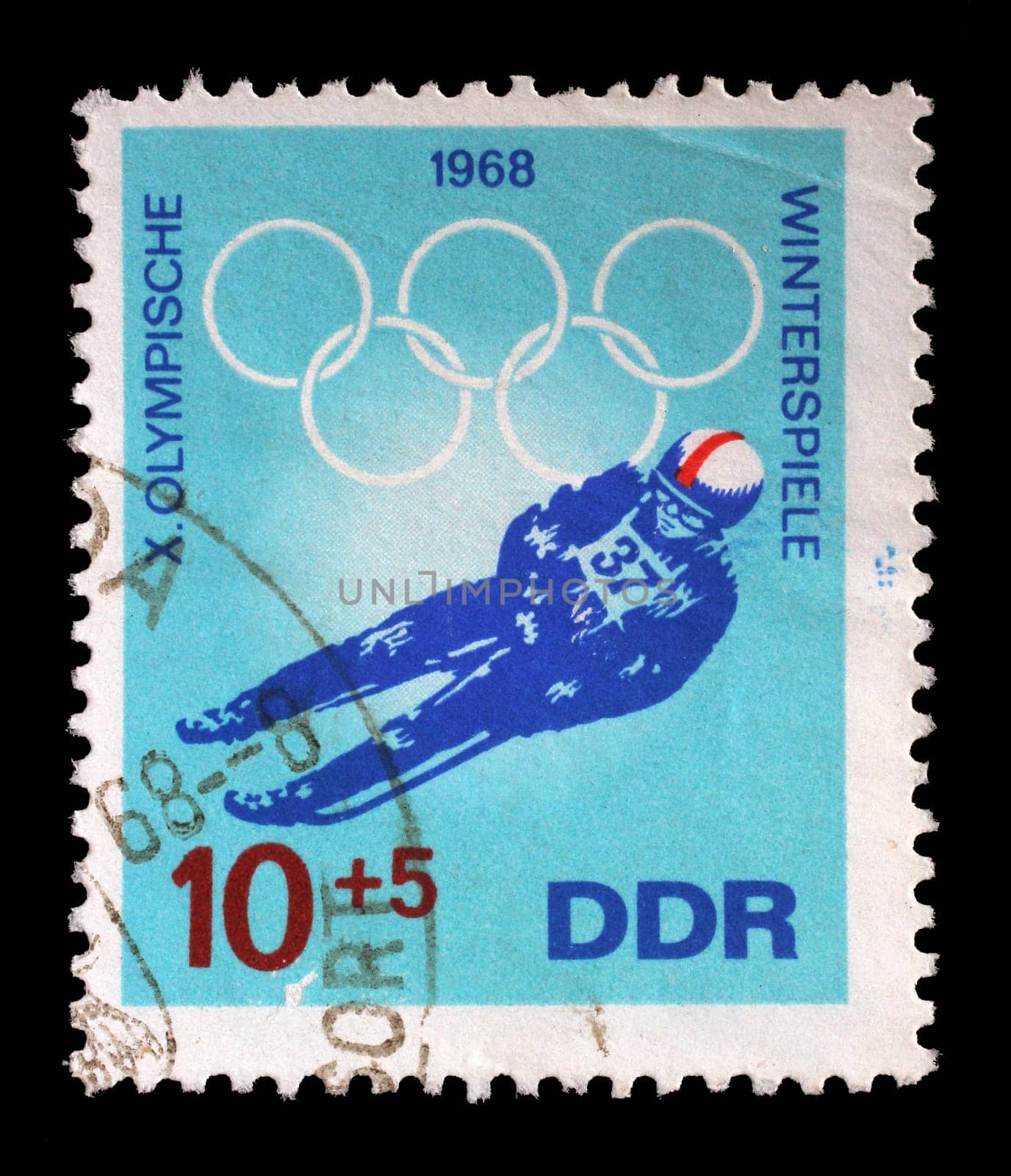 Stamp issued in Germany - Democratic Republic (DDR) shows Luge, Winter Olympics 1968 in Grenoble, circa 1968.