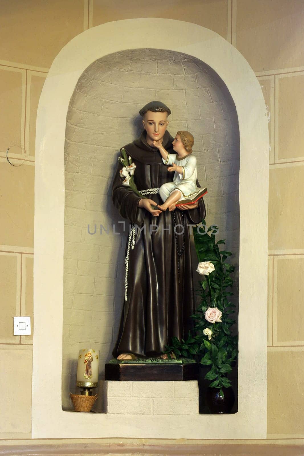 Saint Anthony of Padua holding child Jesus, statue in the church of the Saint Peter in Ivanic Grad, Croatia