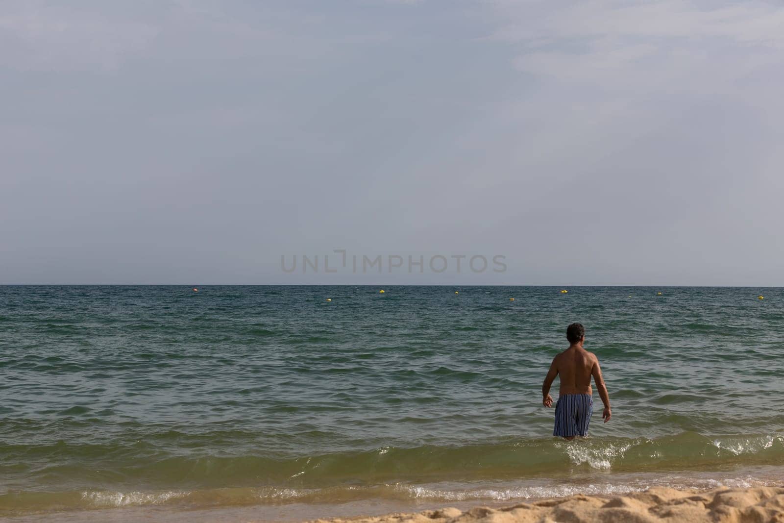 MANTA ROTA, PORTUGAL - AUGUST 25, 2017: People at the famous beach of Manta Rota in Algarve. This beach is a part of famous tourist region of Algarve.