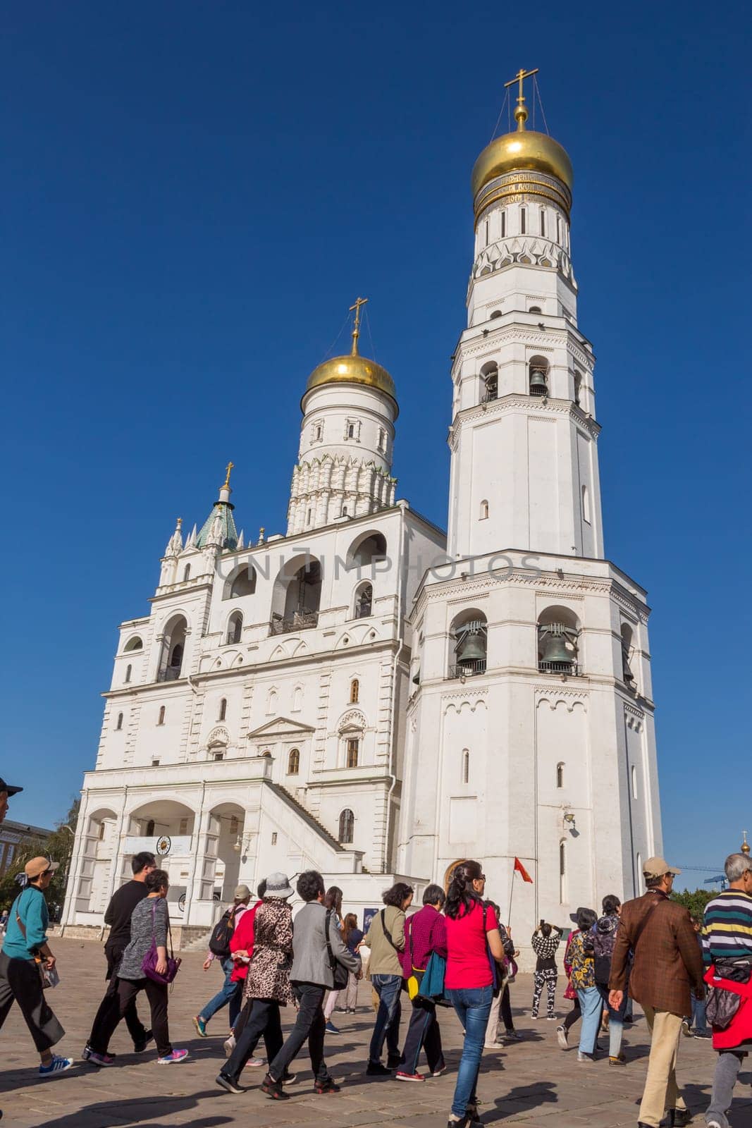 MOSCOW, RUSSIA: AUGUST 31, 2019: People visiting the Assumption Cathedral of the Moscow Kremlin. Russia