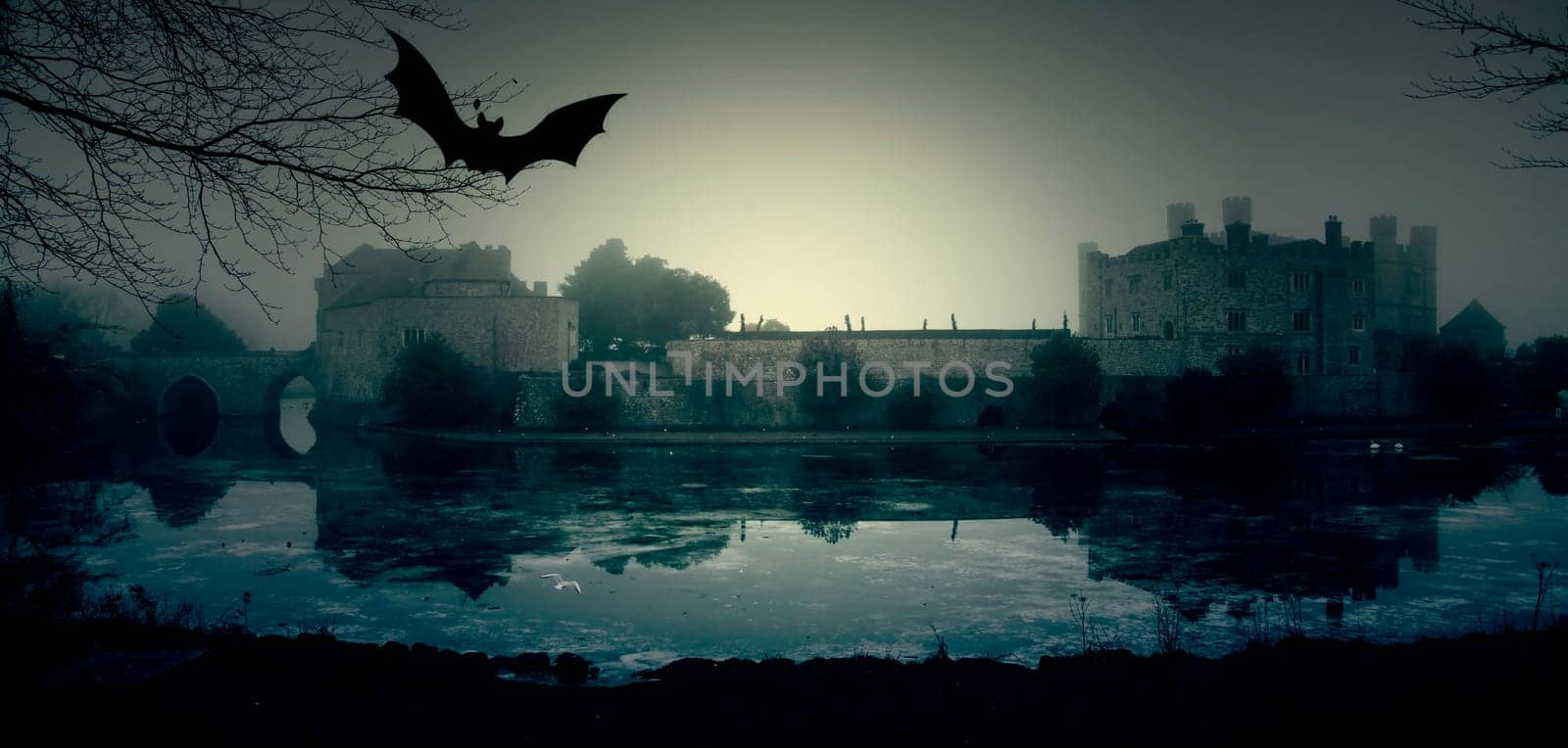 Haunted castle at mysterious, spooky night. Halloween concept.