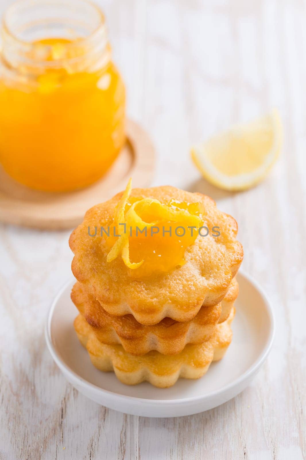 Homemade lemon curd tarts on kitchen table