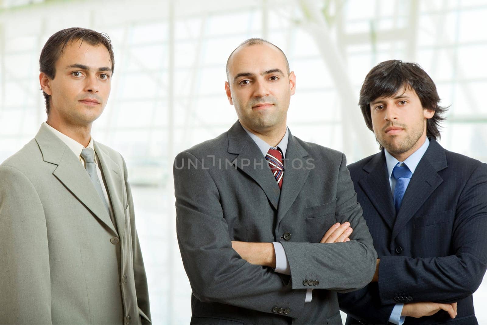 three business men at the office