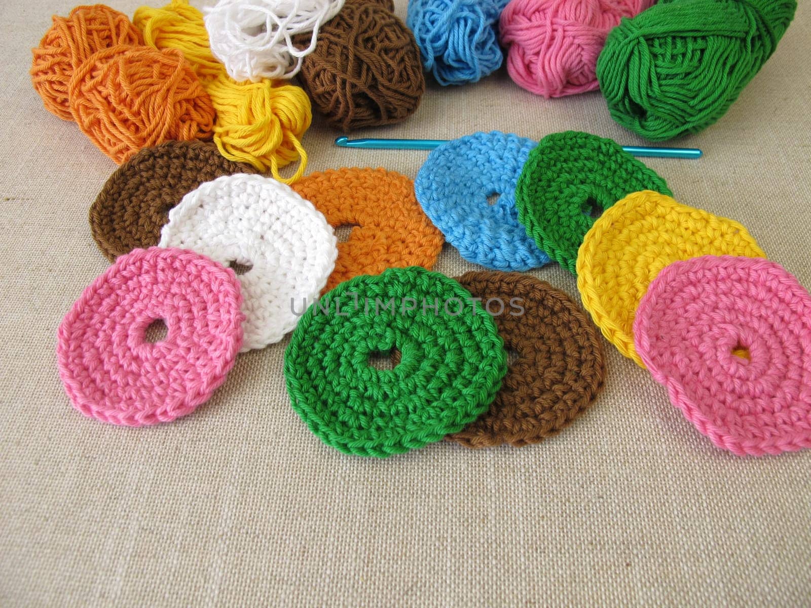 Crocheted, reusable, washable cosmetic pads made of wool - make-up removal pads for facial cleansing
