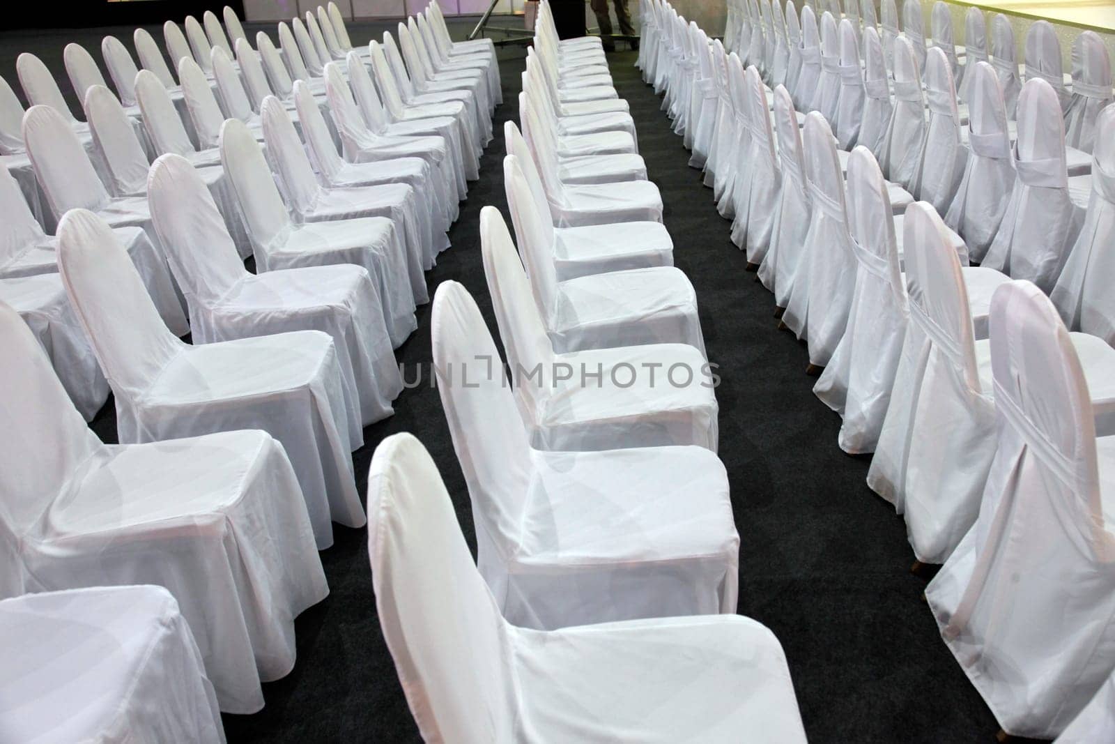 Rows of white chairs