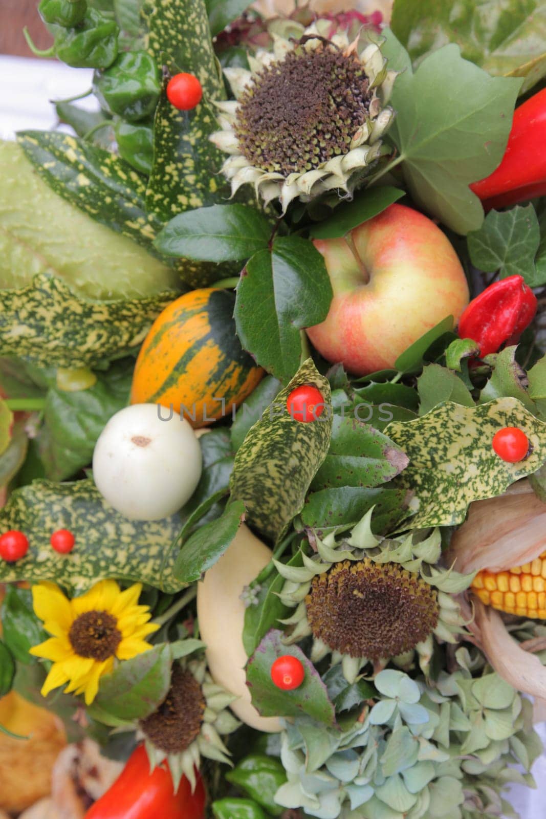 Arangement of apples and flowers