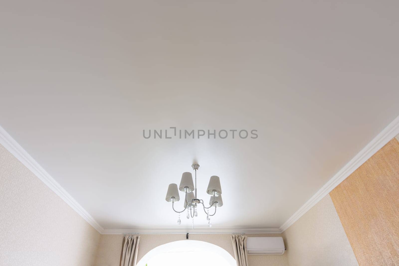 Classic white matte ceiling in the hall