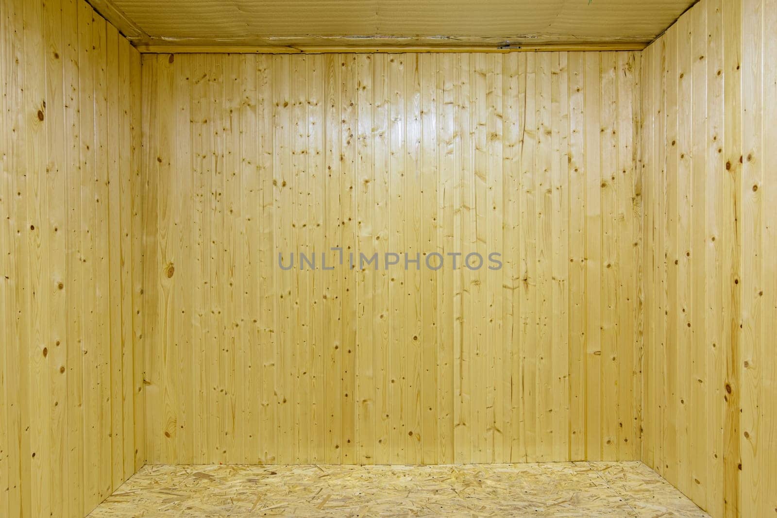 The walls in a frame wooden house are finished with clapboard