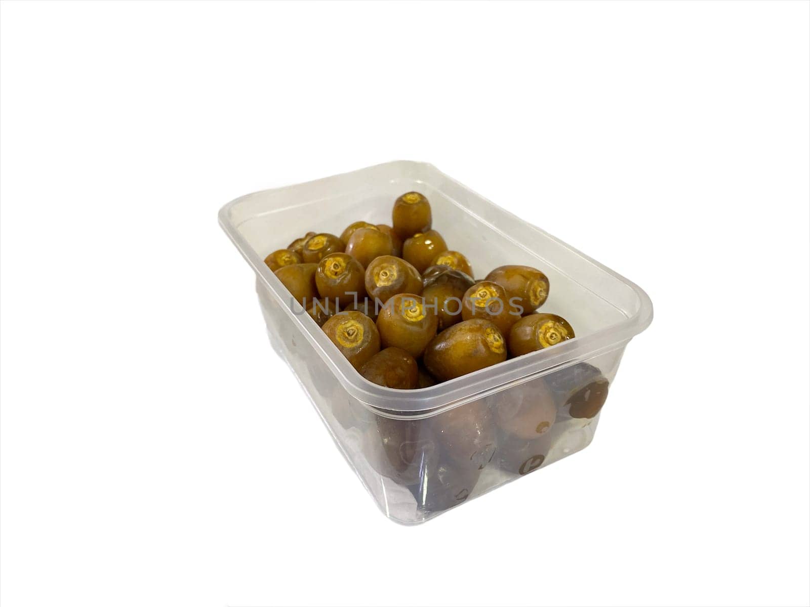 Fresh raw dates fruits isolated on white background. Selective focus