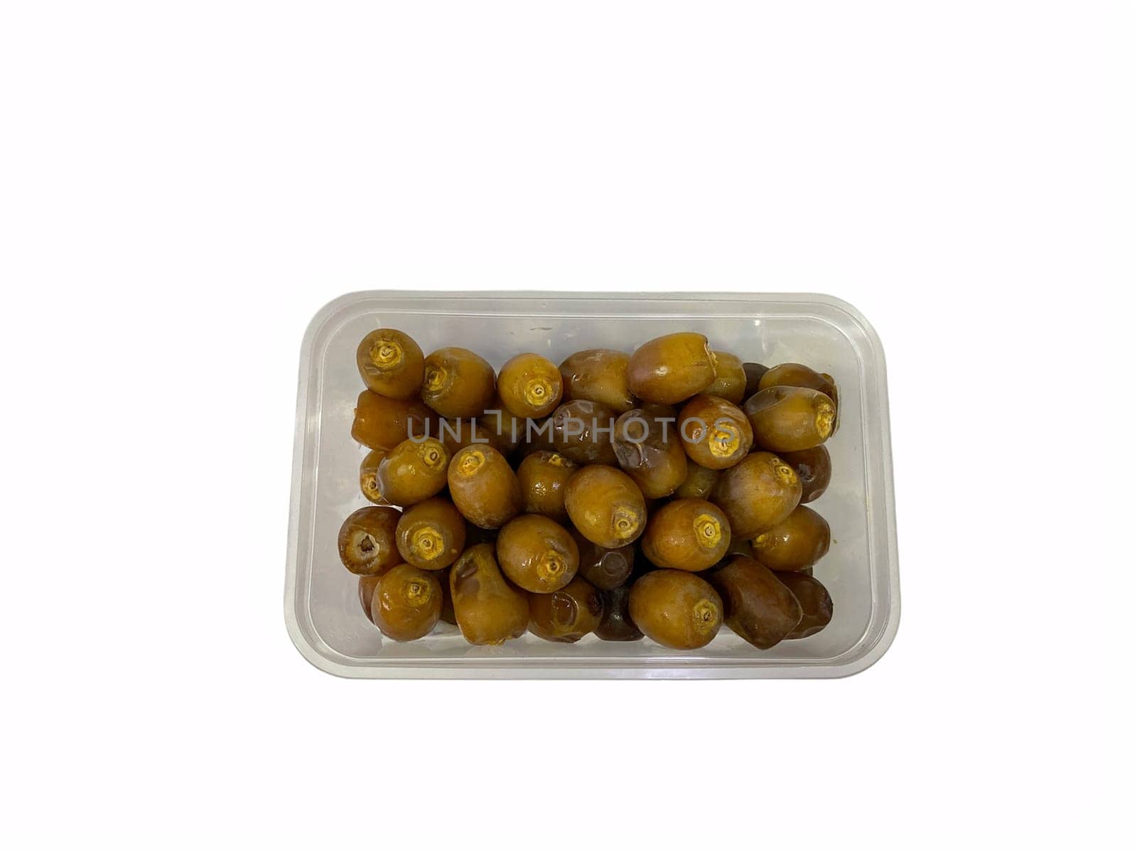 Fresh raw dates fruits isolated on white background. Selective focus