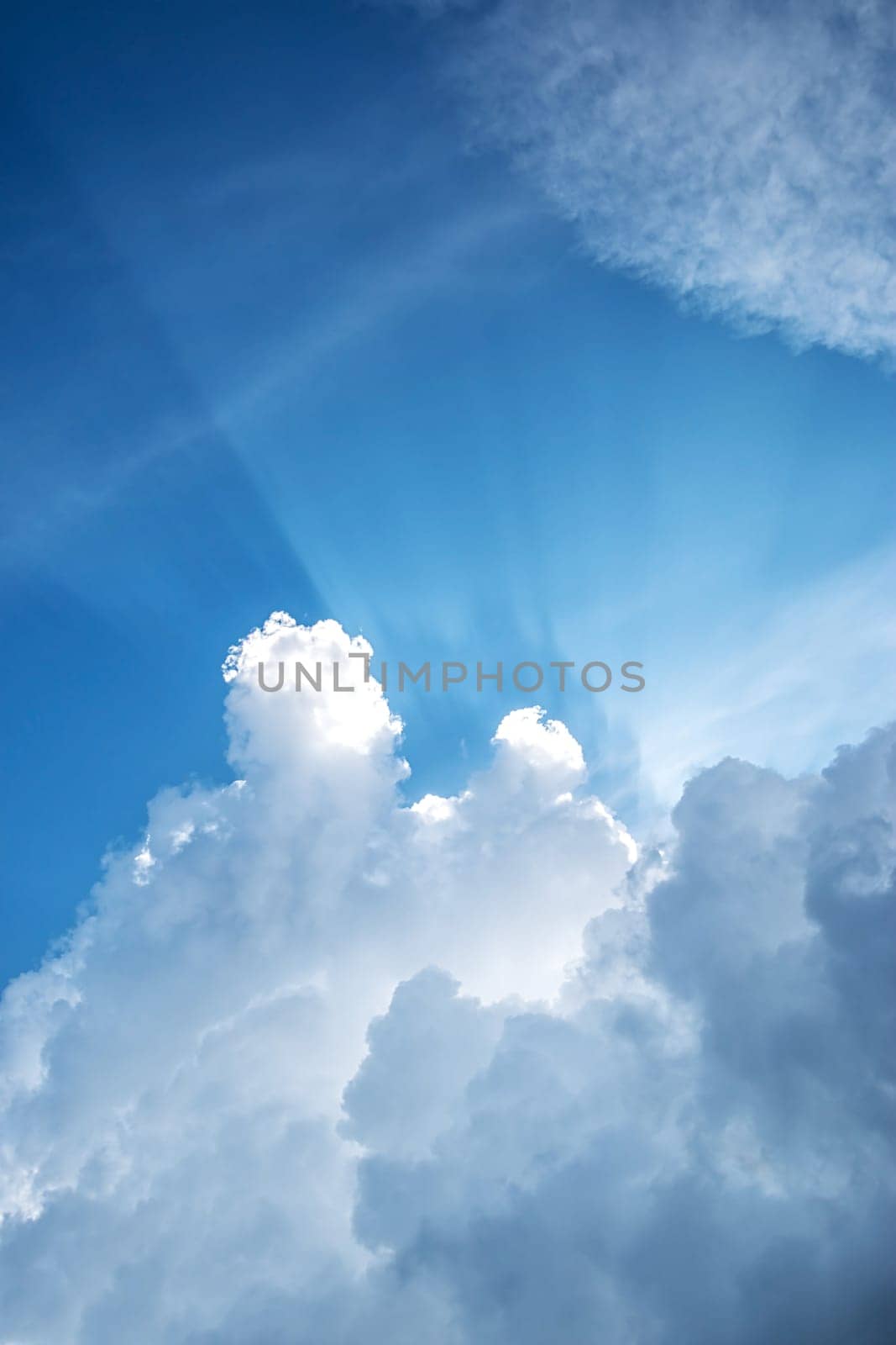white clouds on the blue sky on sunny day