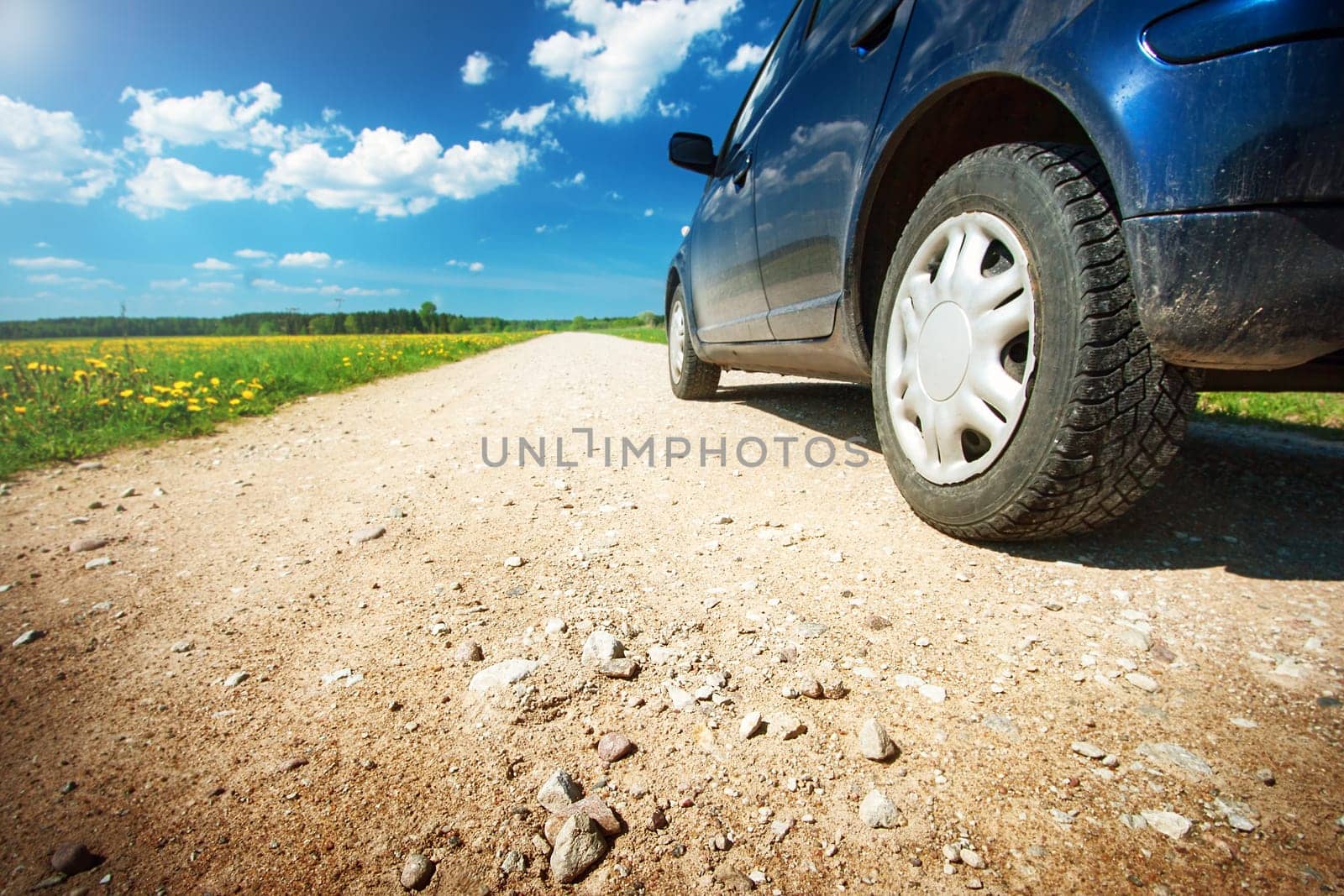 Car tires on gravel goad