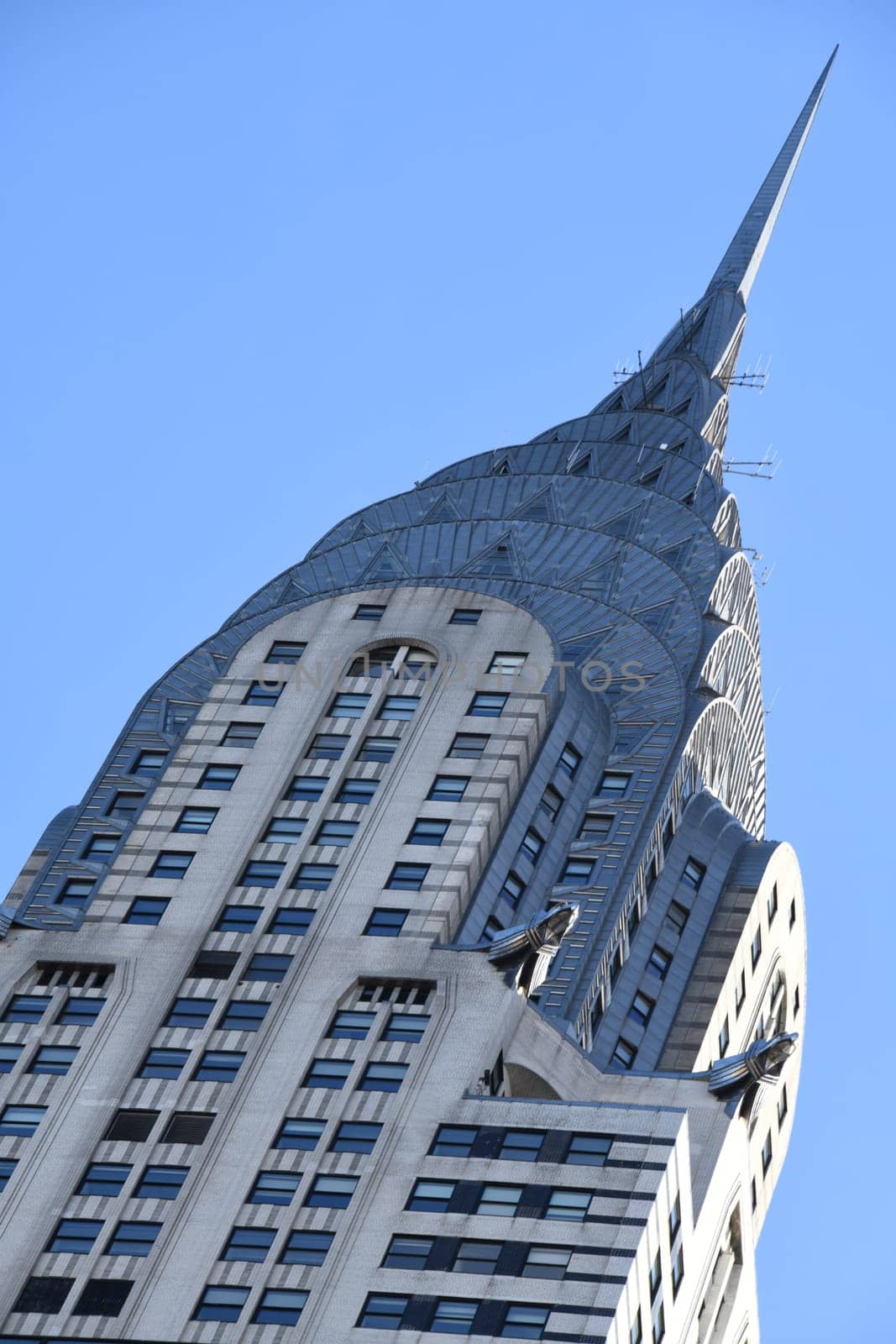 The historic Chrysler Building is located in the Midtown district of Manhattan and is one of the landmarks of NYC - New York City. It was listed as a National Historic Landmark in 1976.