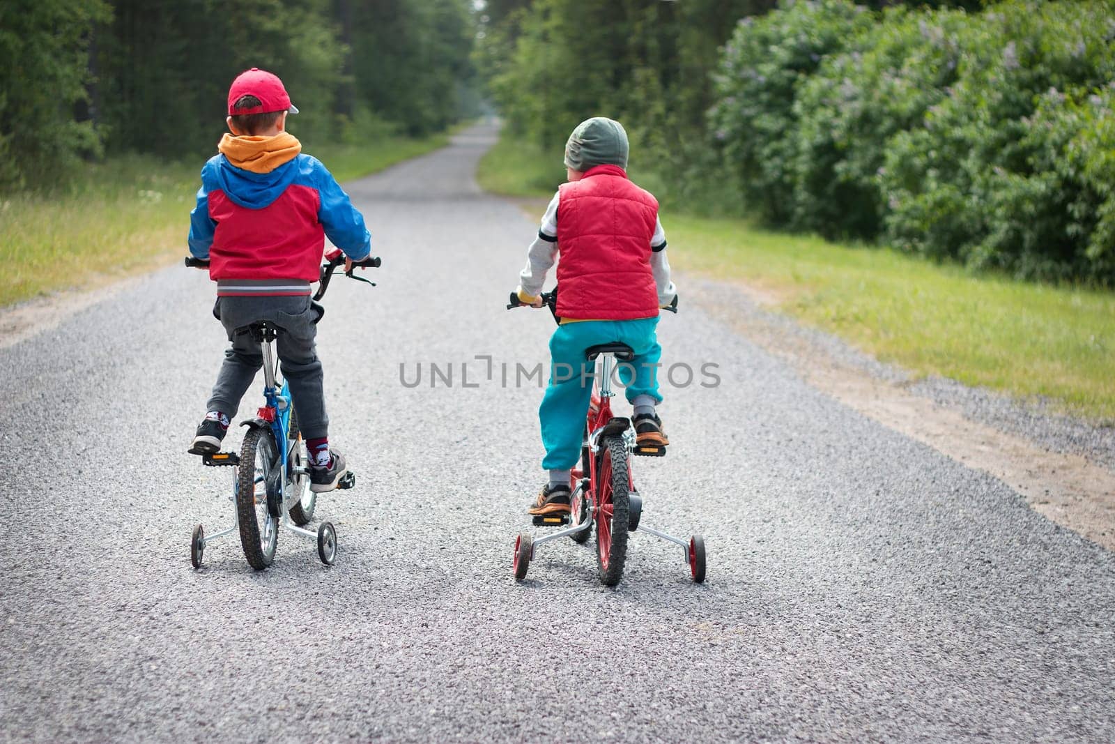 child on a bicycle at asphalt road
