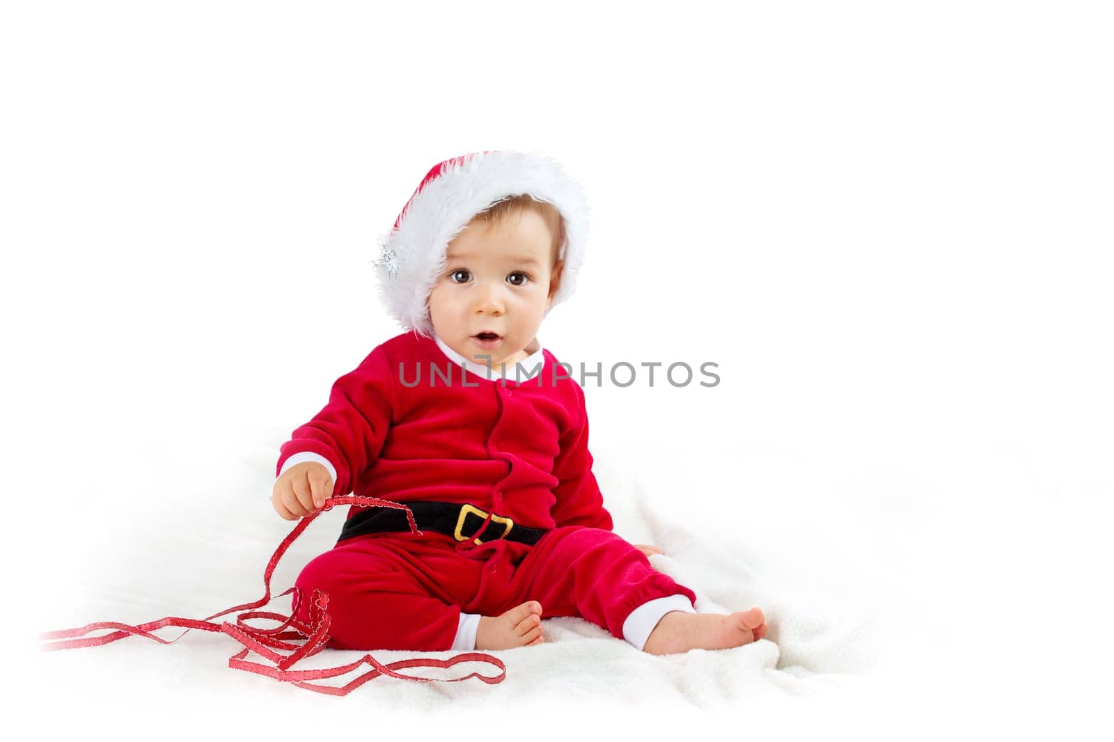 little Baby isolated on white background in santa costume