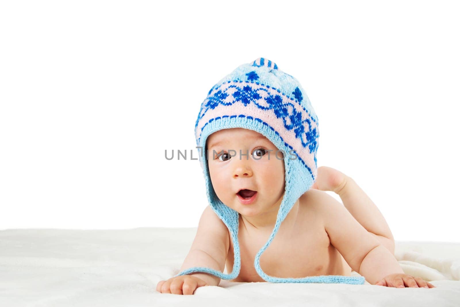little baby isolated on white background lying on soft blanket
