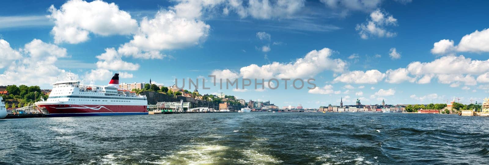 View to Stockholm, Sweden with a ferry from sea in summer