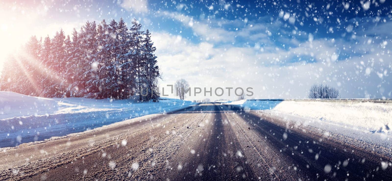 Car on winter road covered with snow