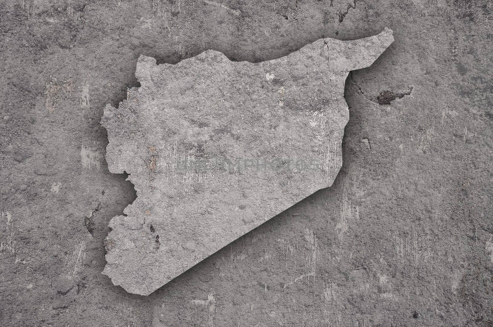 Map of Syria on weathered concrete