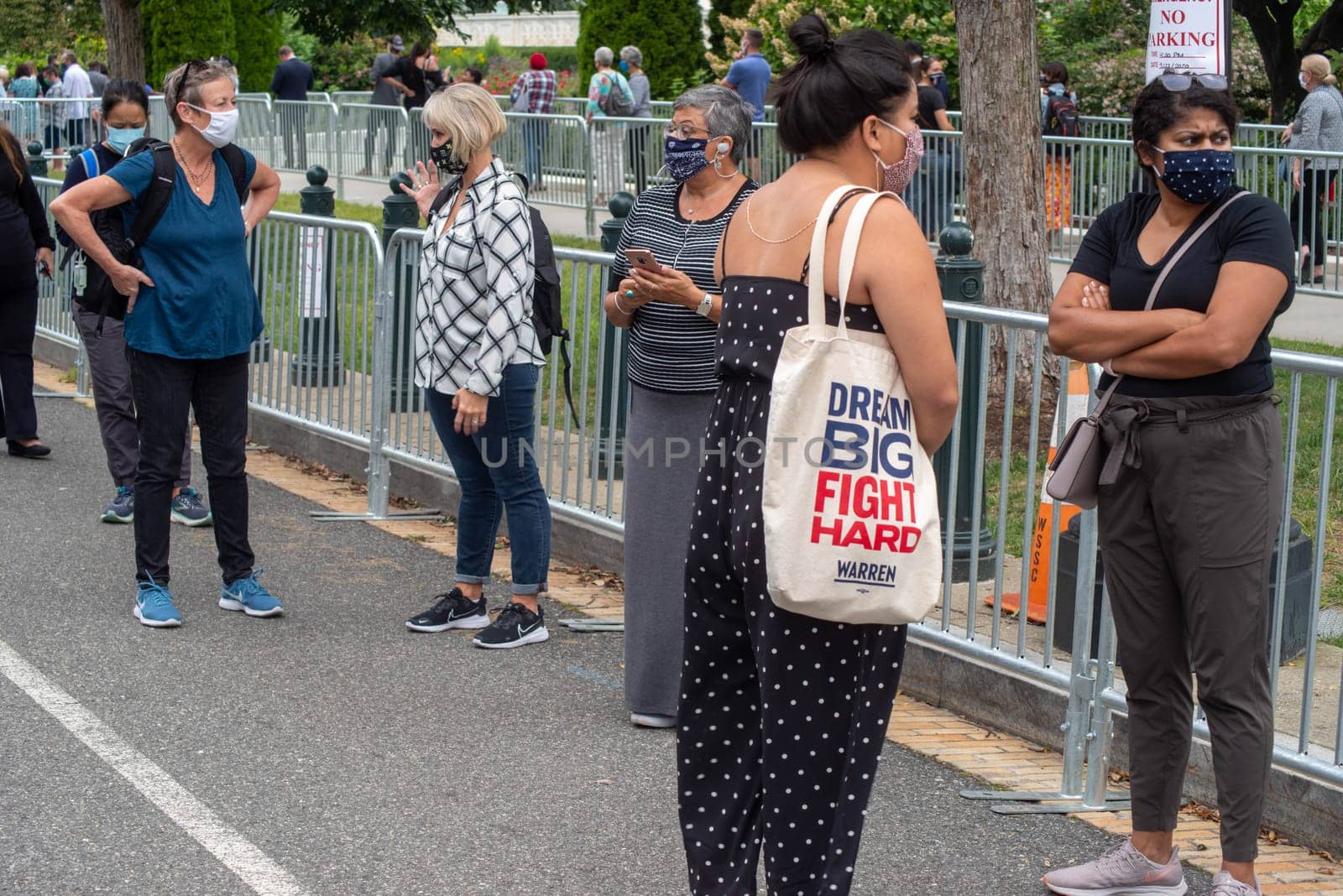 Washington, DC / USA - 9/24/2020: Mourners in long lines in front of Capital building to pay last respects to Justice Ruth Bader Ginsburg