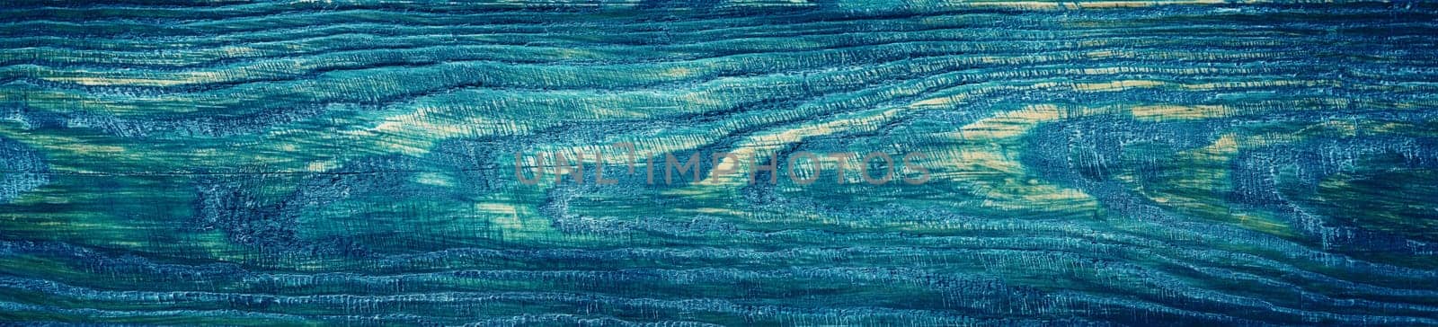 Old wooden planks. Blue background with painted boards
