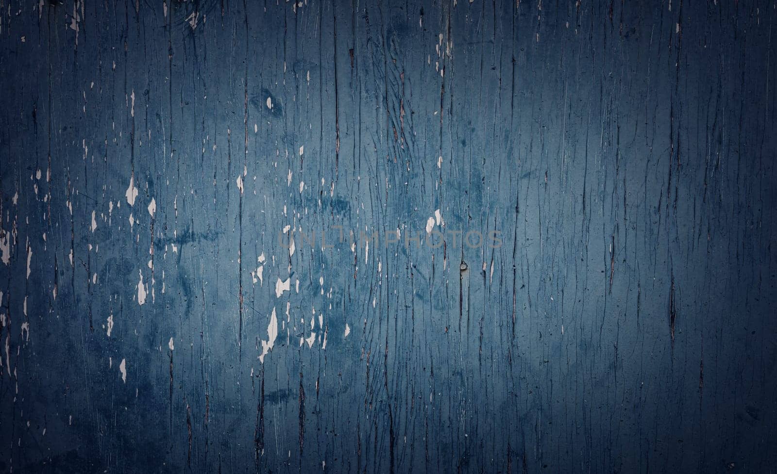 Old blue wooden planks. Rustic background with painted boards. Faded wall texture