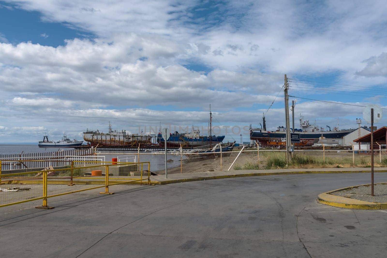 ships in a shipyard in the port of Punta Delgada, Chile