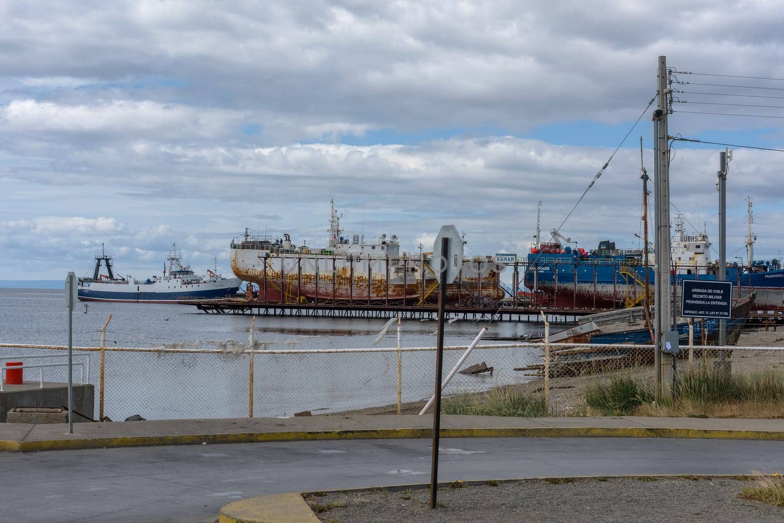 ships in a shipyard in the port of Punta Delgada, Chile