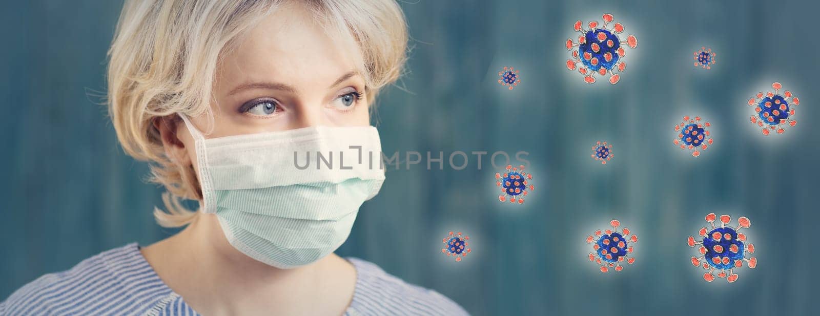 young woman in medical face protection mask indoors on blue background. Sick person