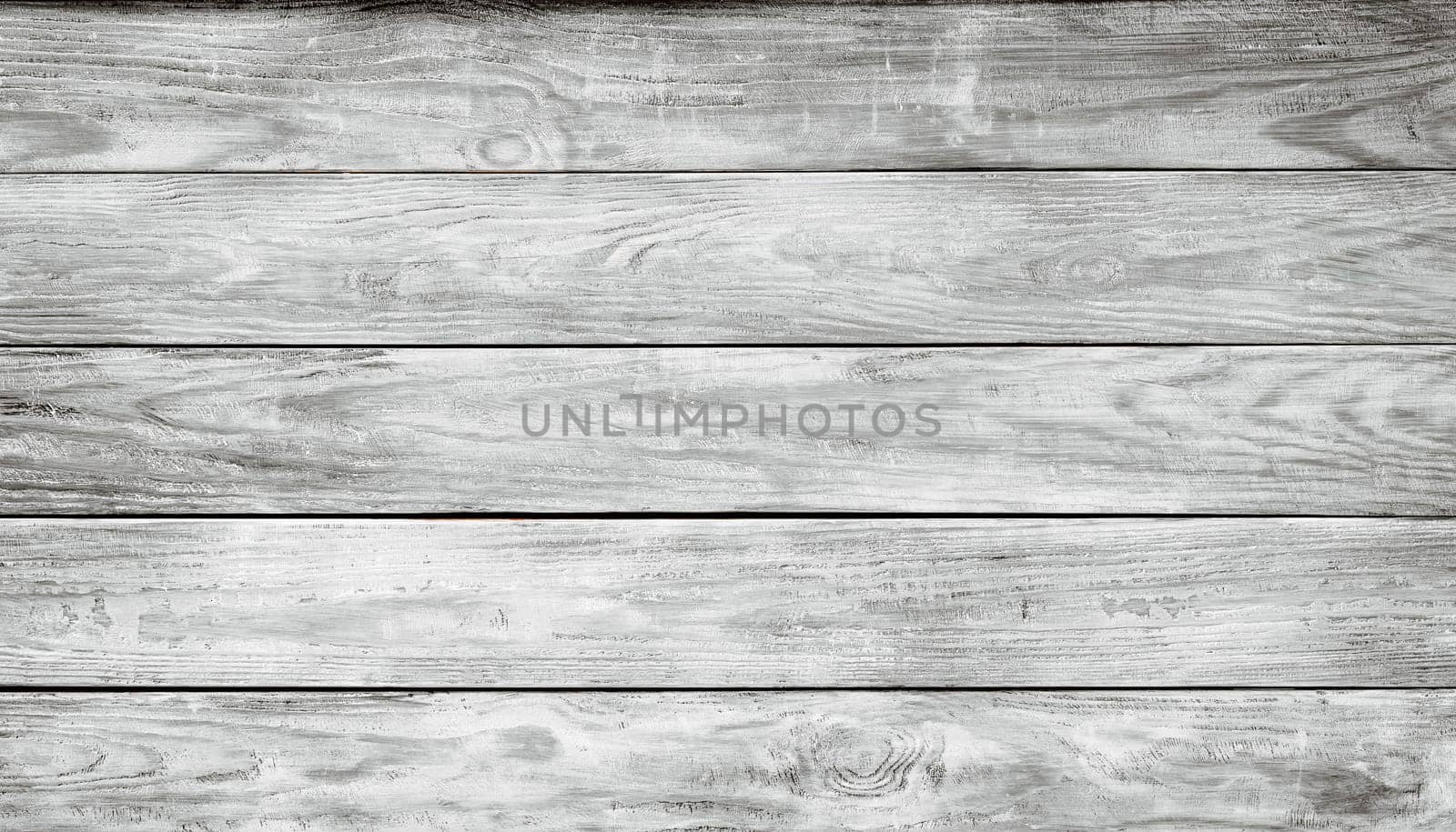Old wooden planks. Blue background with painted boards