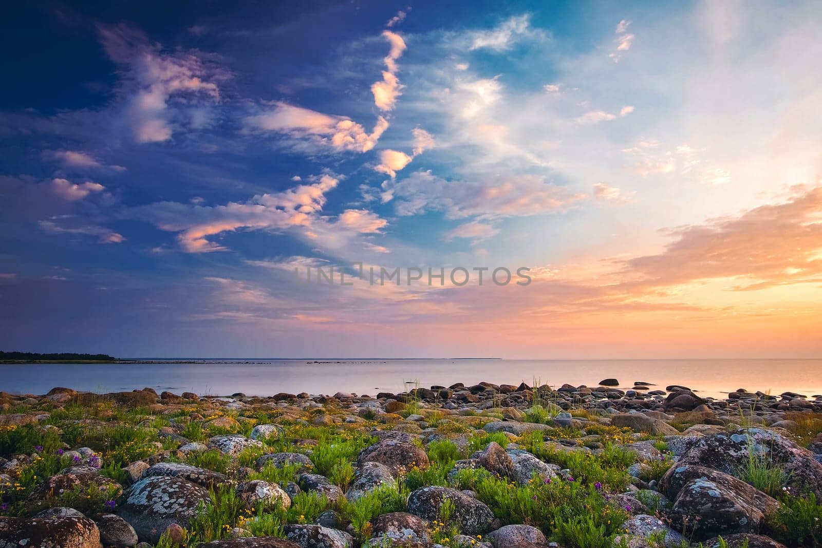 Rocky shores at the sea in beautiful sunset light