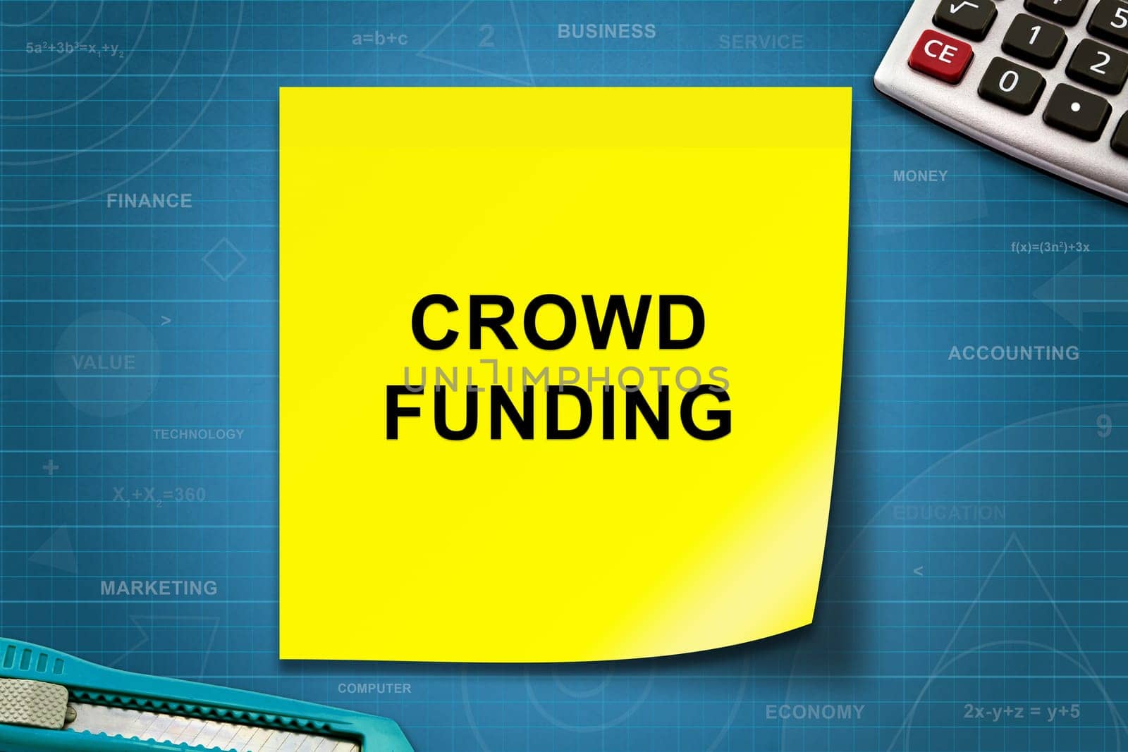 crowd funding text on yellow note with graph paper