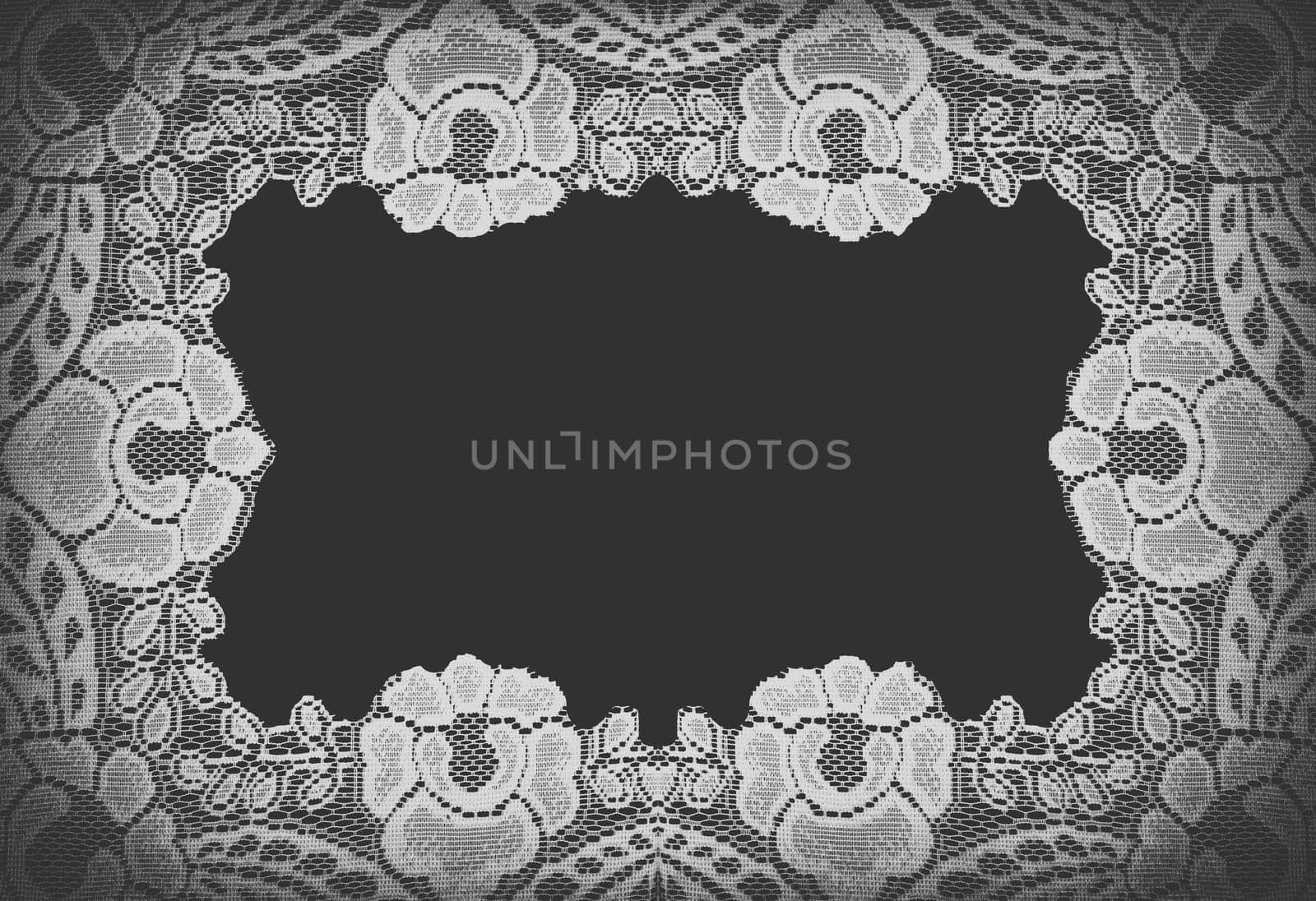 handmade lace doily on a black background