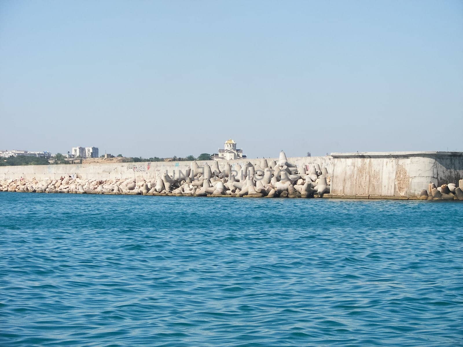 Wavecut on the auberezes at the port of Sevastopol. Fighting the waves, the Black Sea.