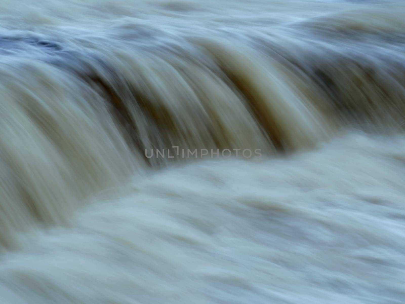 waterfall, water stream dropping over the cliff, long exposure