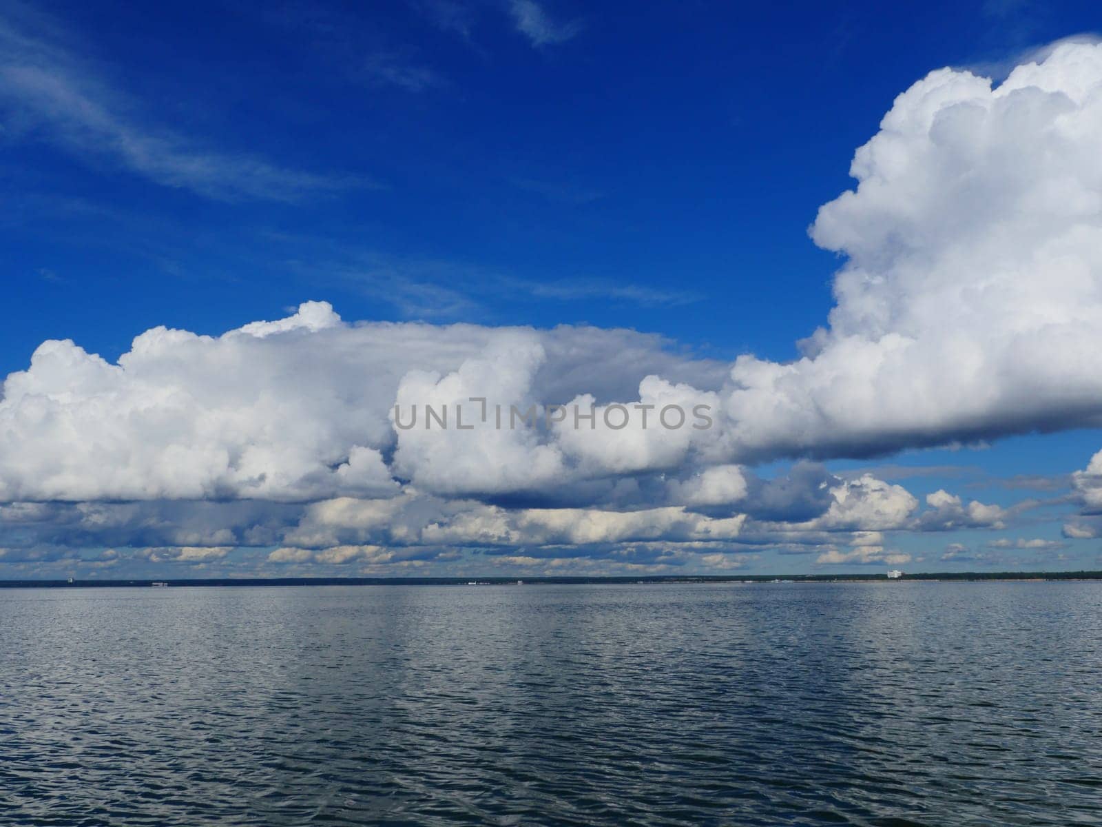 clouds are reflected in the sea waves scenic seascape view from the ship