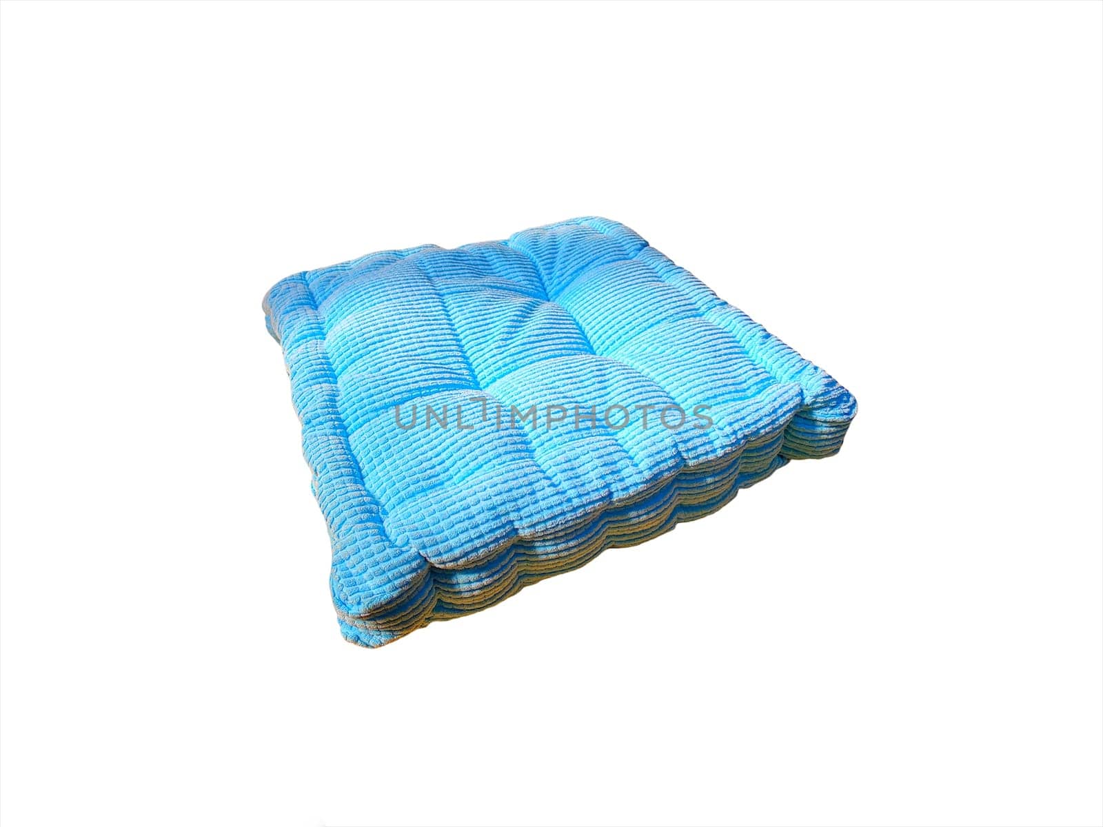 Blue pillow isolated on white background. Selective focus