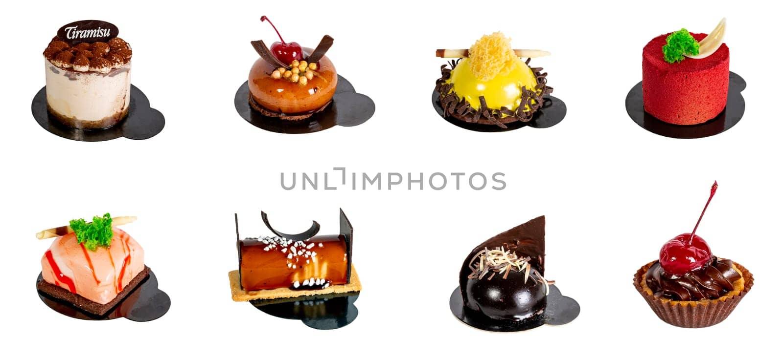 Set of Appetizing cake isolated on a white background on a dark stand. Gourmet cooking. Haute cuisine