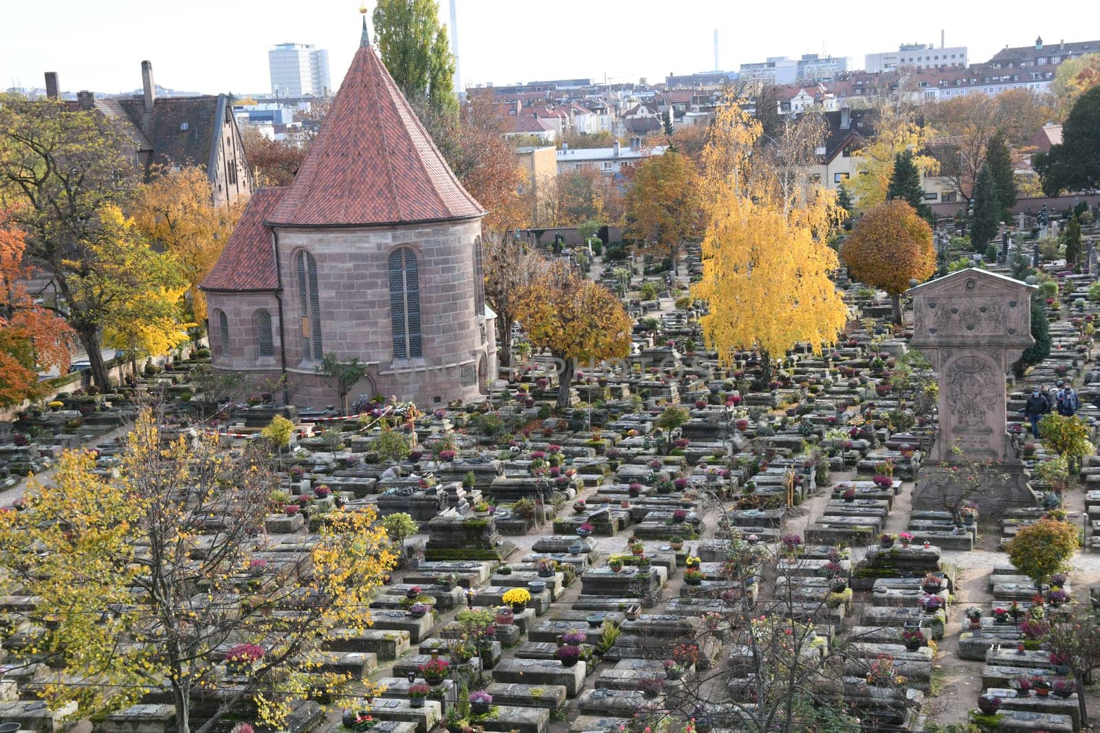 The historic St. John's Cemetery in Nuremberg in autumn with the wooden cutter's chapel built in 1513-1515 and a Stations of the Cross by Adam-Kraft from 1506-1508.
