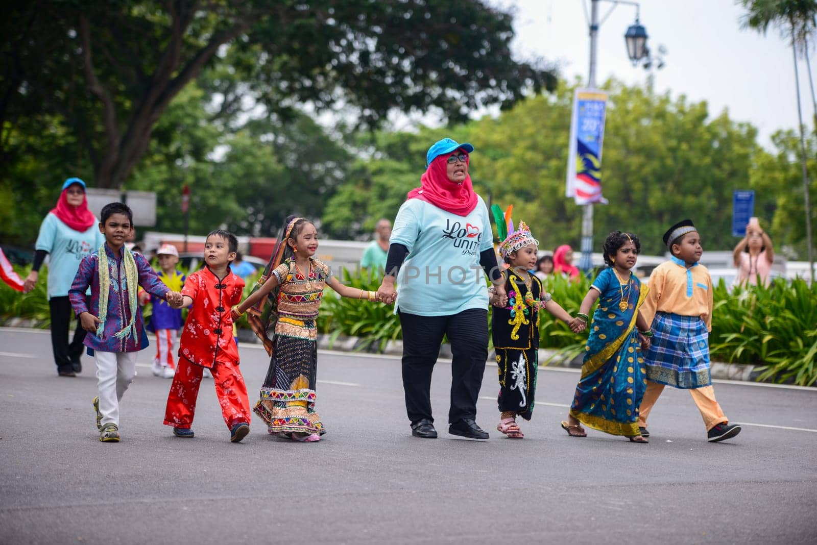 Georgetown, Penang/Malaysia - Aug 31 2016: Children from different races walk to together during independence parade.