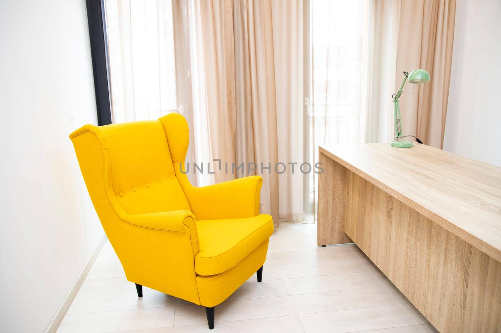 Chief executive or manager office with desk and armchairs, office interior