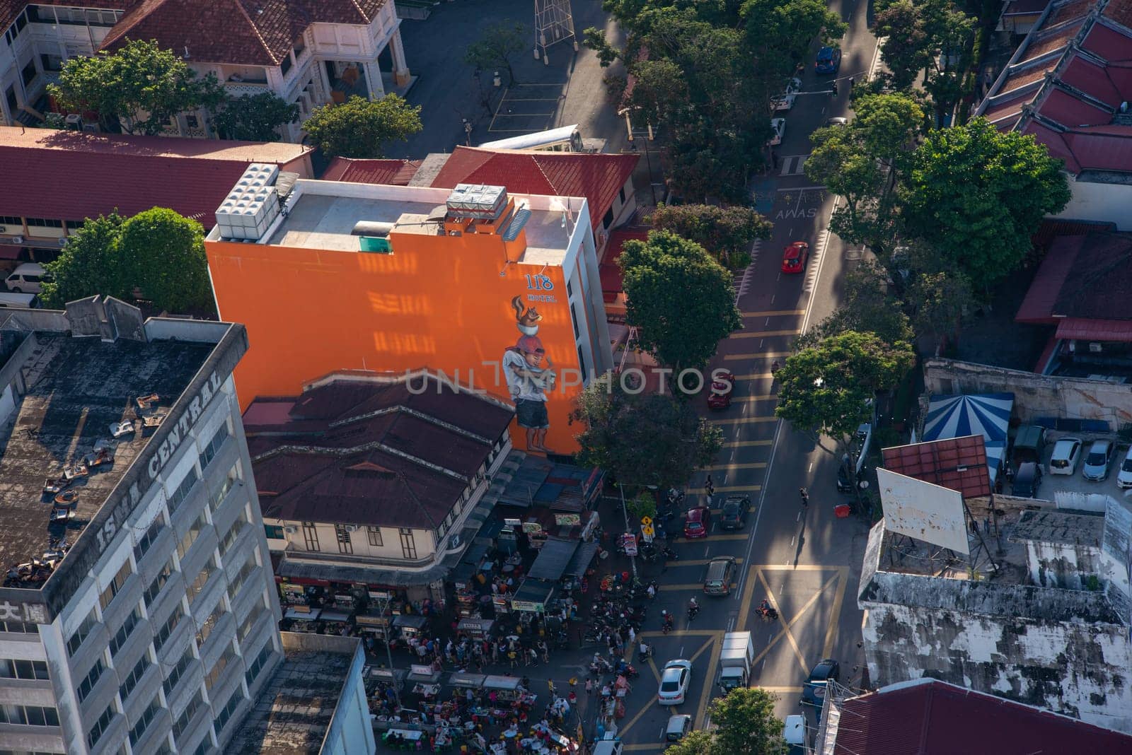 George Town, Penang/Malaysia - Jun 25 2017: Aerial view mural a boy having a bowl of noodles with a squirrel.