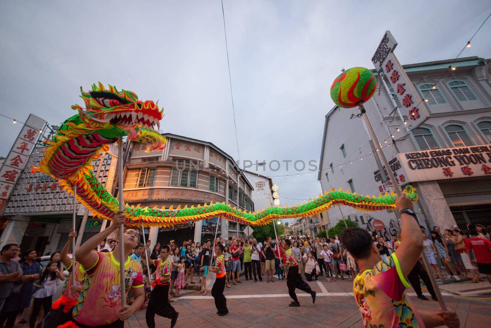 George Town, Penang/Malaysia - Jul 07 2017: Dragon dance chase the pearl at street.