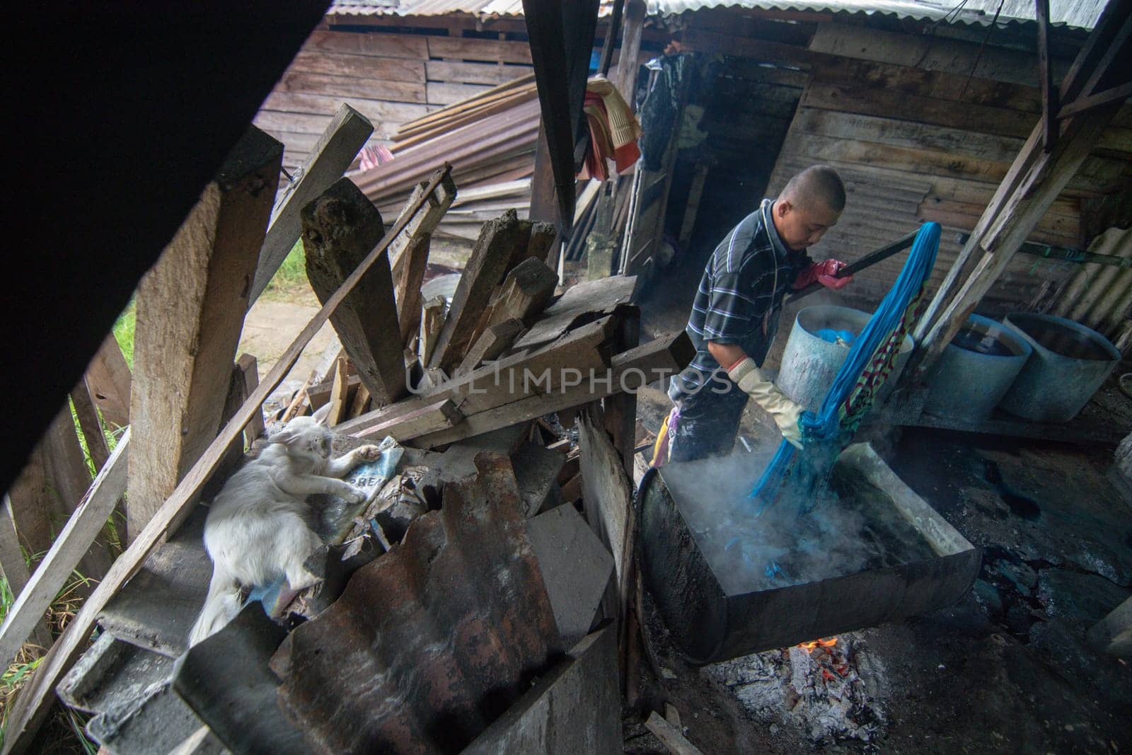 Kota Bahru, Kelantan/Malaysia - Jul 15 2017: Batik washing is one of the batik making process.